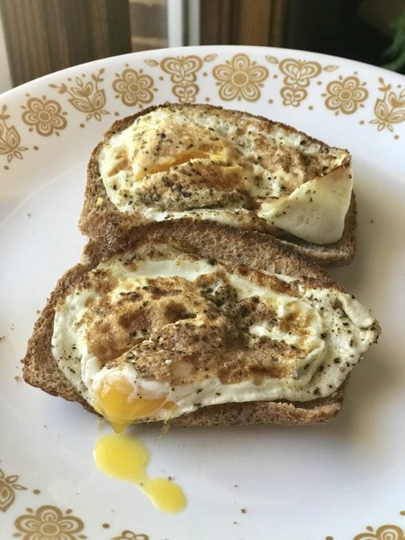 two fried eggs on toast.