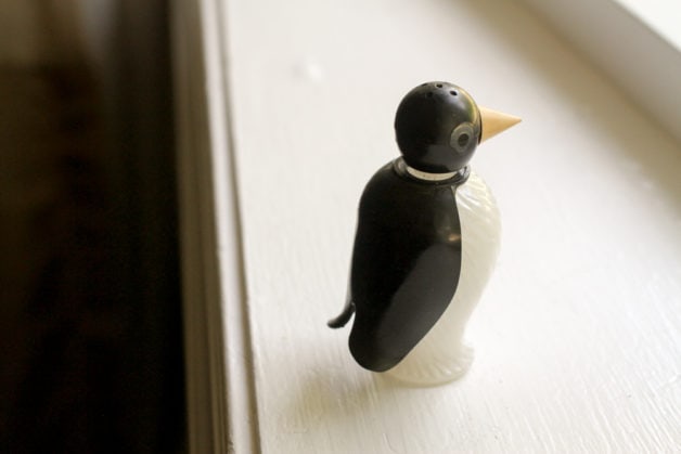 A small penguin salt shaker.