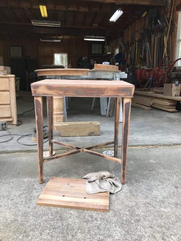 A sanded side table.