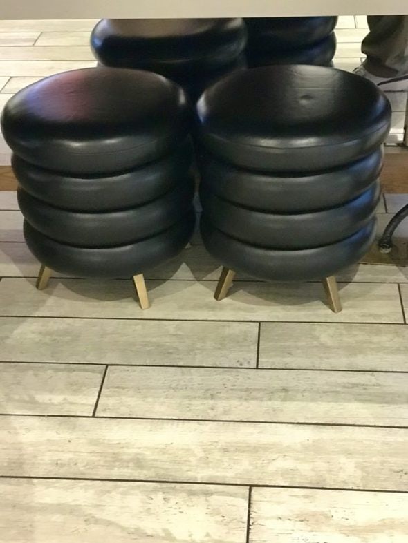 Two black stools.