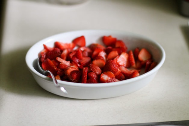 Strawberries in a white bowl.