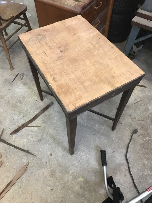 A table with a bare top.