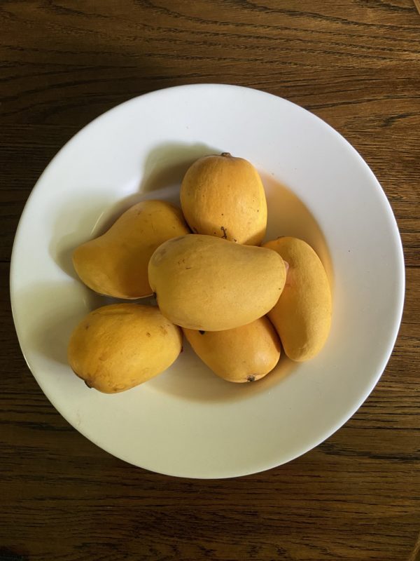 bowl of ripe mangoes.