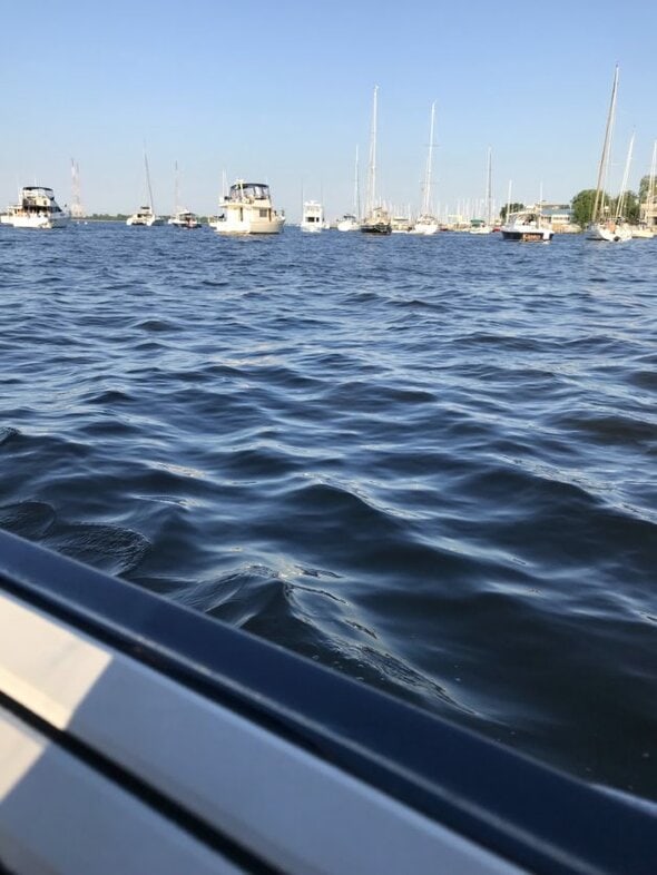 The view off the side of a boat.