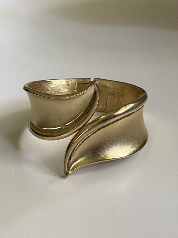 Trifari gold bangle.