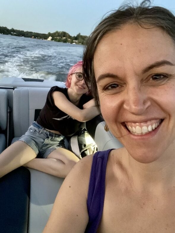 Kristen and Zoe in a boat.
