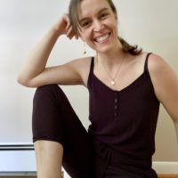 Kristen in a jumpsuit.