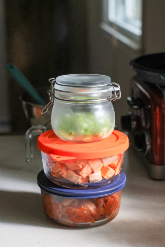 prepped curry ingredients in glass containers.