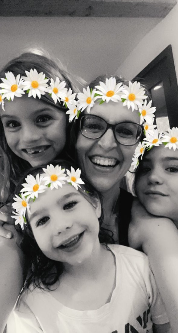 Kristen with three girls.