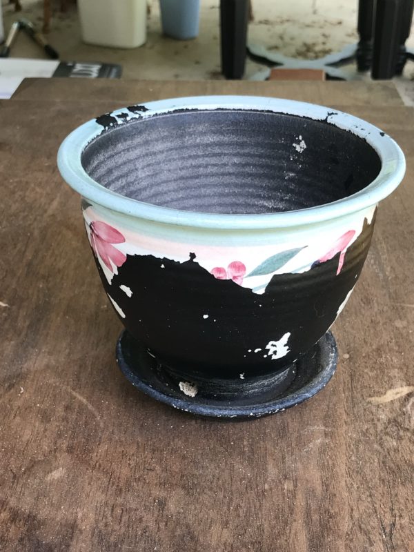 pot with peeling paint.