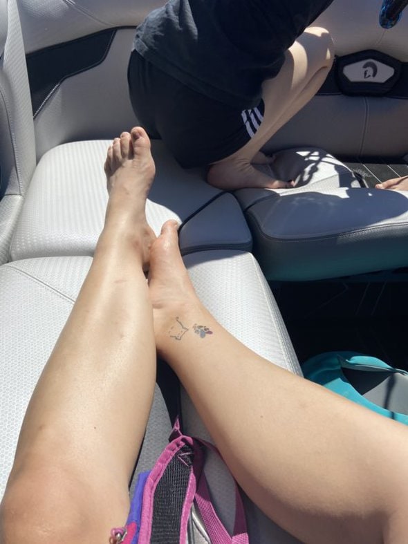 Kristen's ankle with a temporary tattoo.