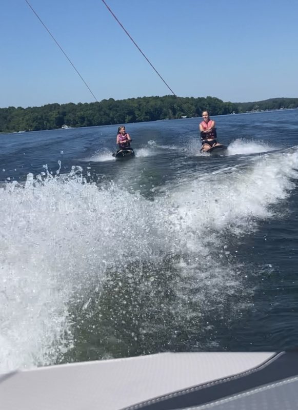 Kristand her niece kneeboarding.