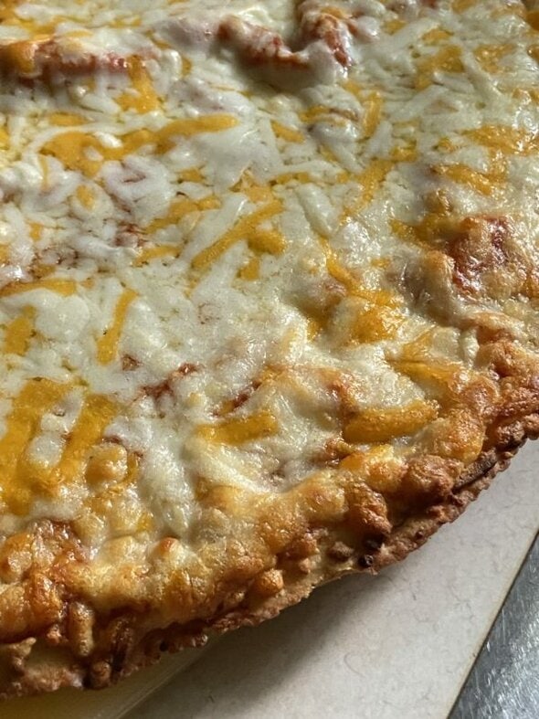 A baked frozen pizza.