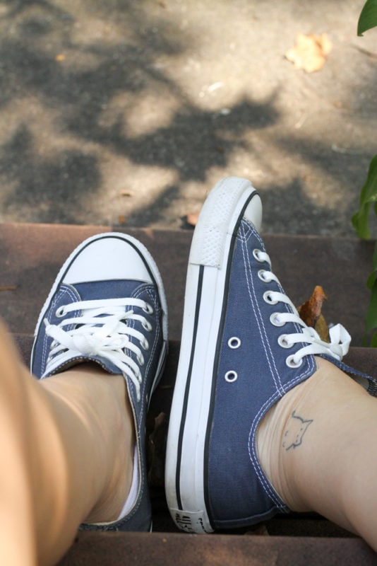 Kristen's feet in the blue converse.