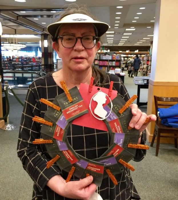 A. Marie with a wreath.