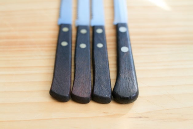 four knife handles.