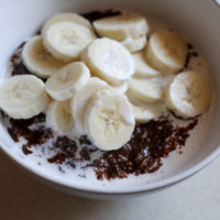 chocolate oatmeal topped with half and half.
