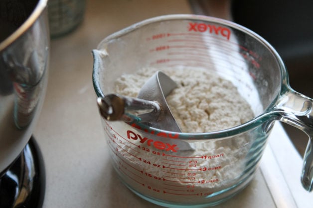measuring cup of flour.