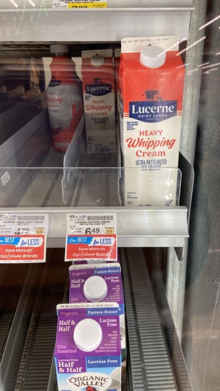 heavy cream in a grocery fridge.