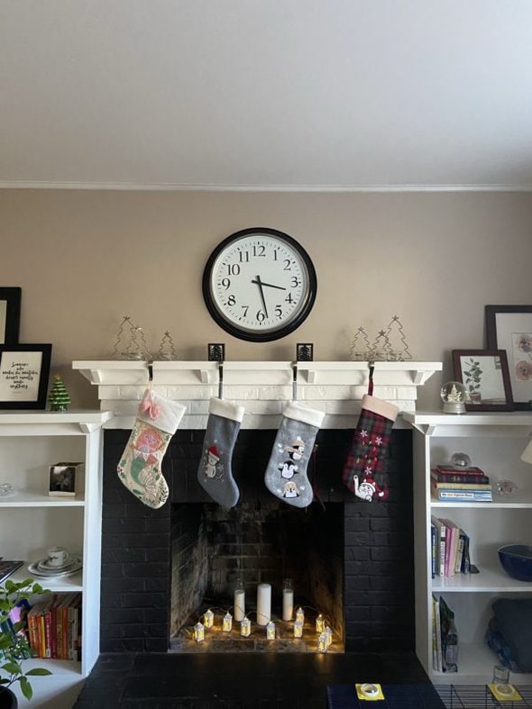 stockings hanging by a fireplace.