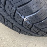 screw in a tire.