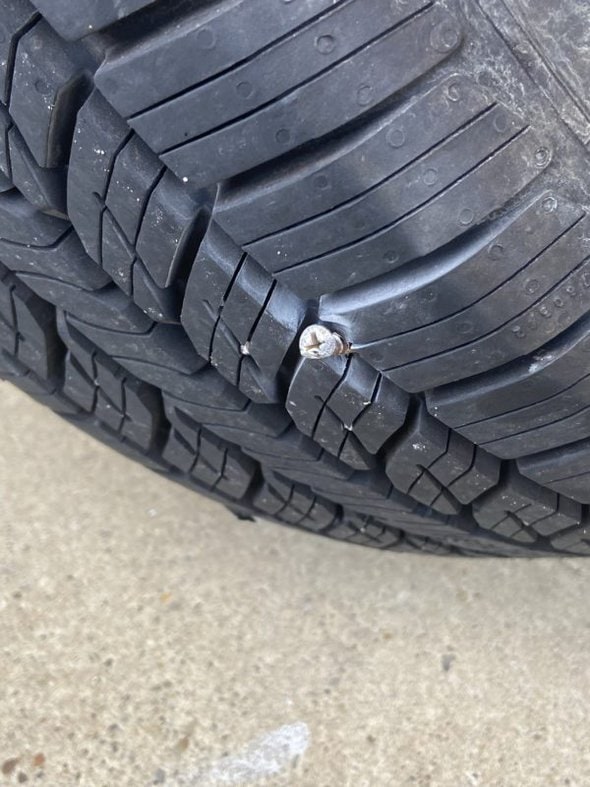 screw in a tire.