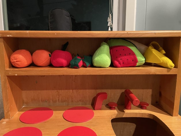 felt fruit on a shelf