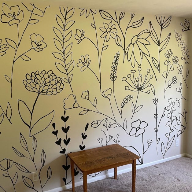 Wall painted with flower mural.