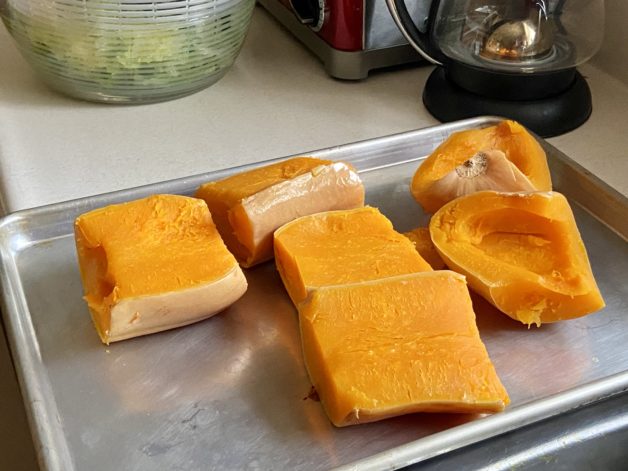 steamed butternut squash in a pan.