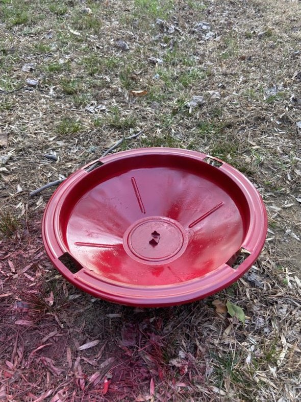 sprayed red metal stand.