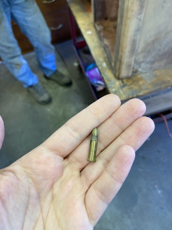 bullet in Kristen's hand.