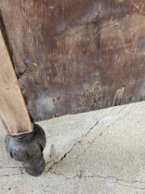 table with chipped veneer.