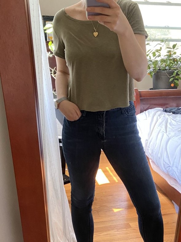 Kristen in a cropped green tee.