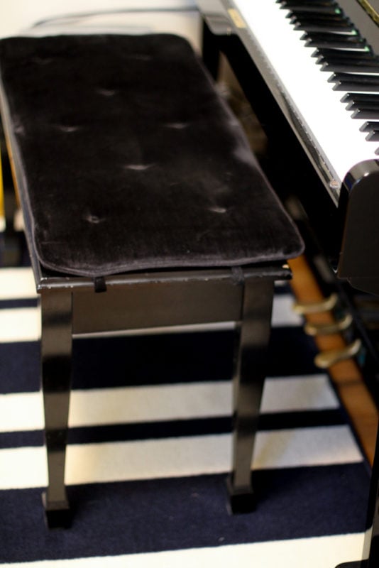 black piano bench.