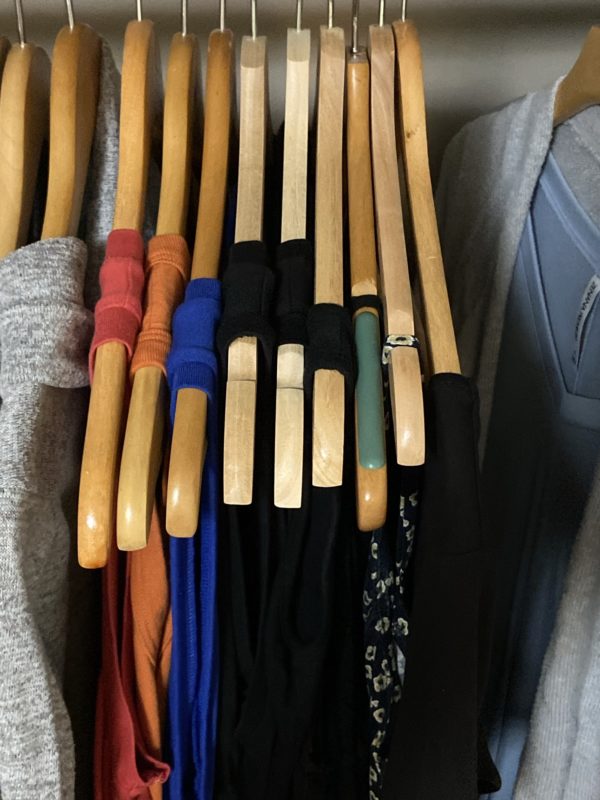 summer clothes on hangers.
