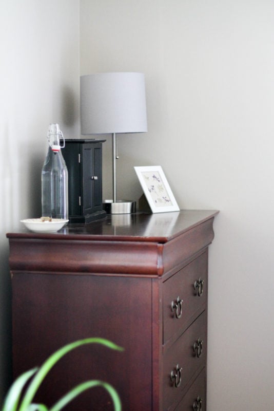 red-stained dresser.