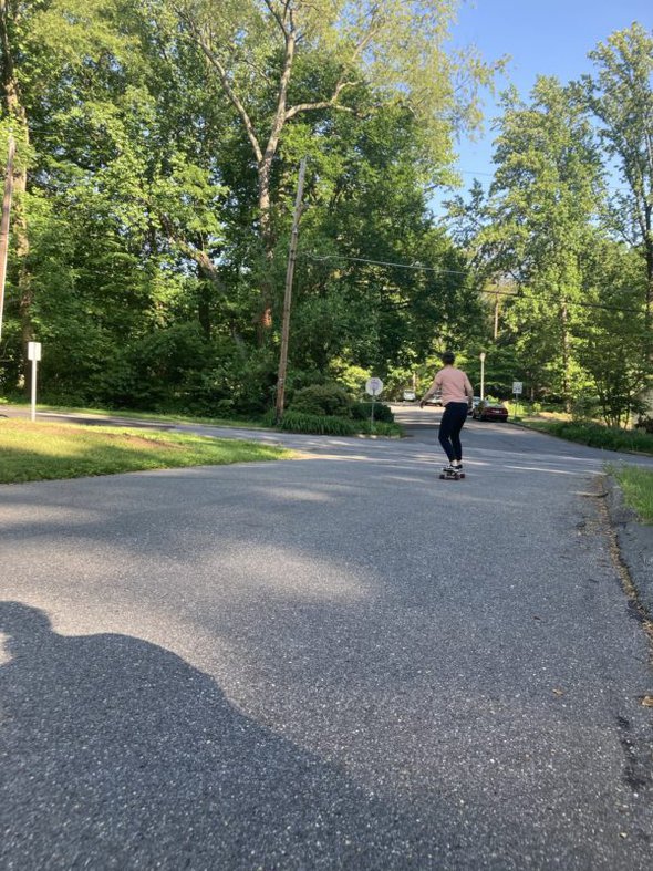 Kristen on longboard.