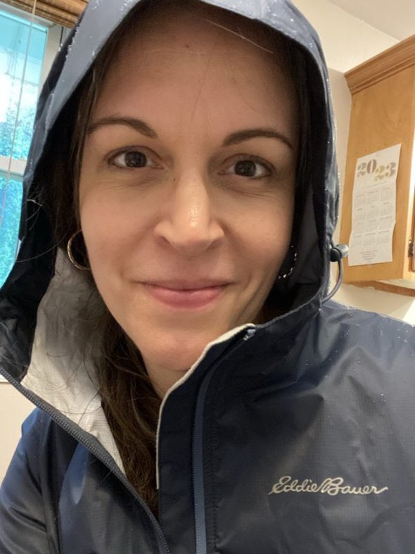 Kristen in a rain jacket.