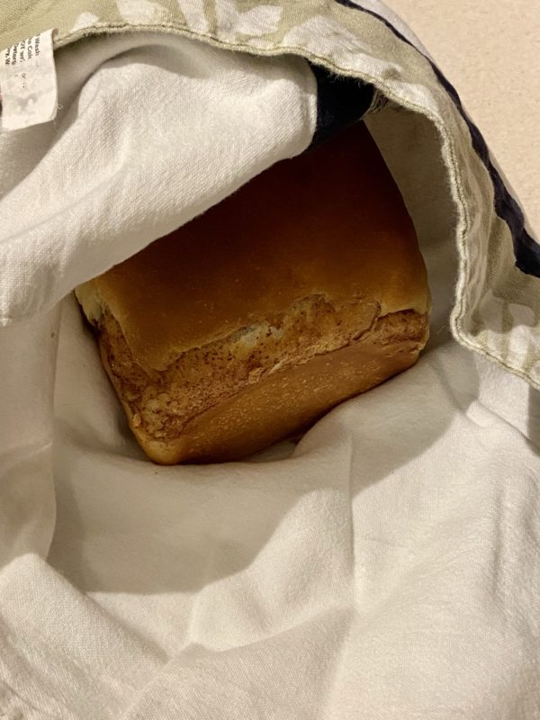 cinnamon bread in a towel.