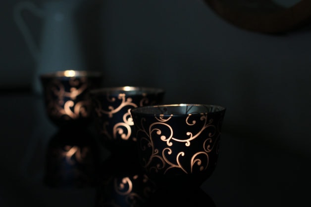 lit candleholders.