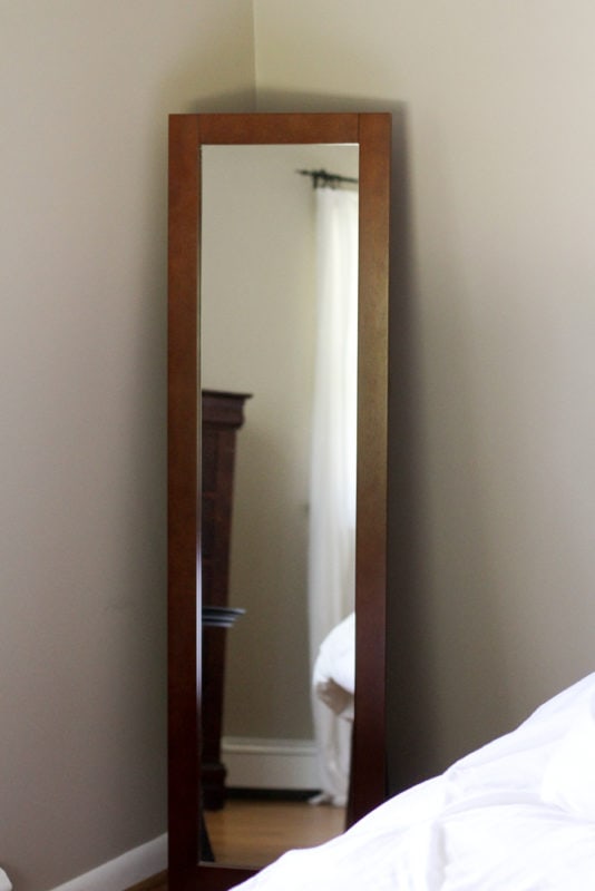 wood framed floor mirror.