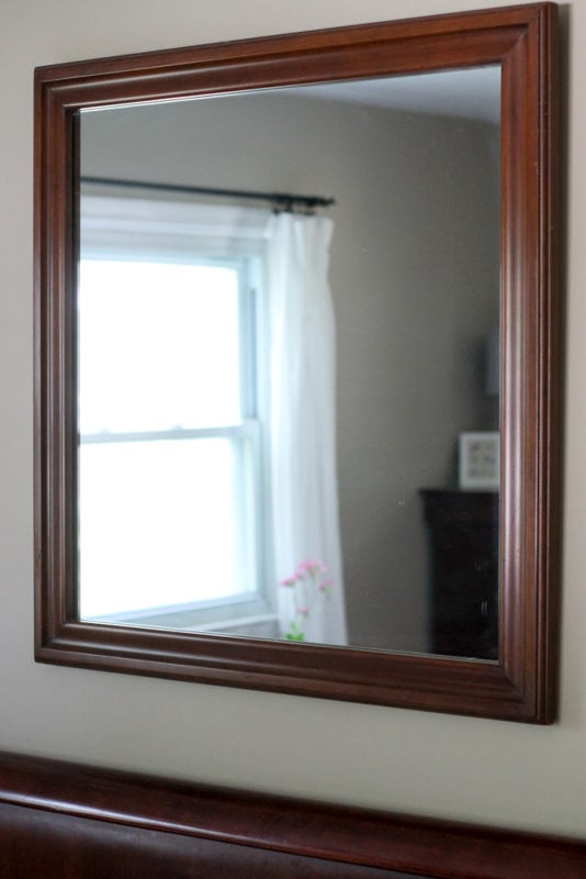 mirror above bed.