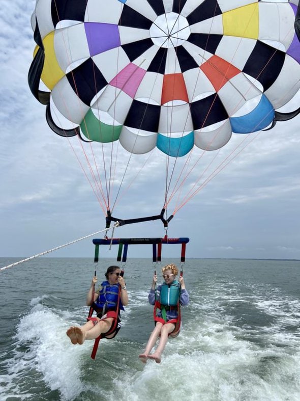 Kristen and Sonia in a parasail.