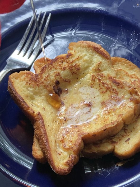 french toast on a blue plate.
