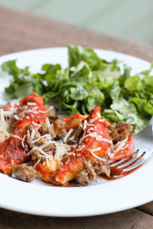 stuffed pasta shells and salad.