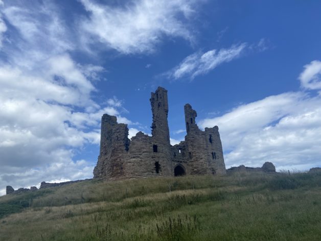 European castle under blue skies.