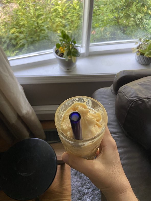 smoothie in kristen's hand.