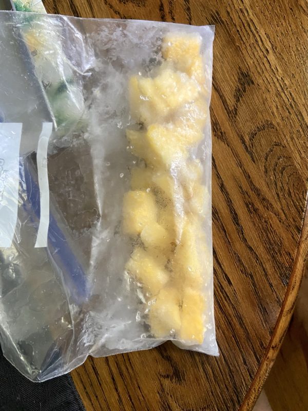 bag of frozen pineapple.
