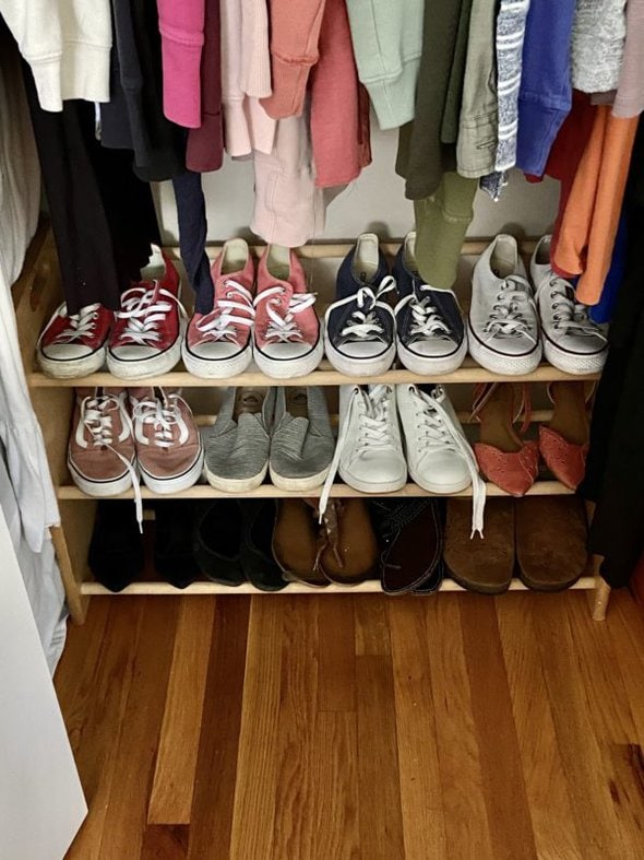 shoe rack in closet.