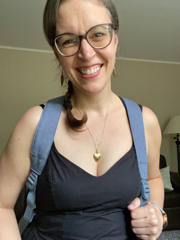 Kriste in black dress.